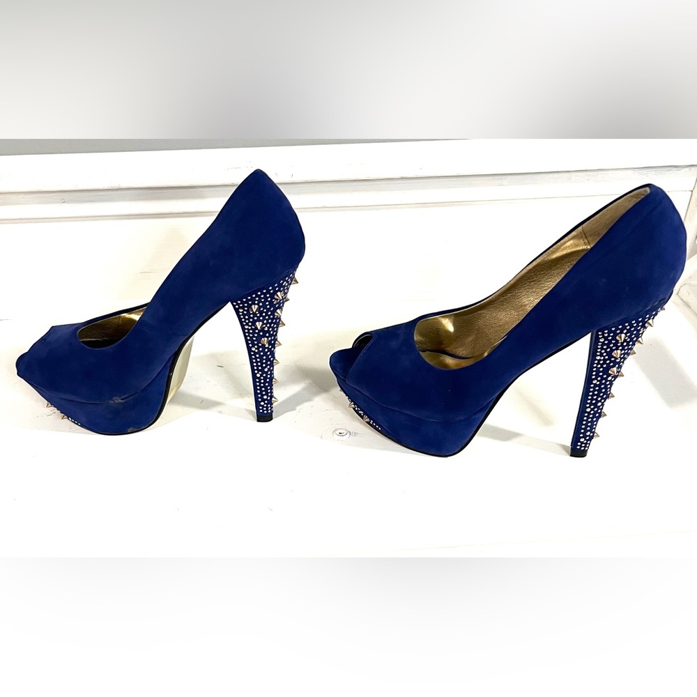 Story Brand spiked and studded heel open toe shoe. Size 10